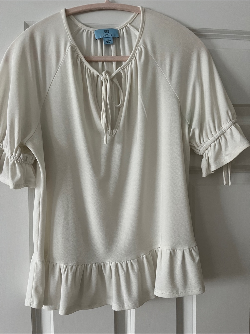 CeCe Cream Tie-Neck Ruffle-Hem Short Sleeve Blouse